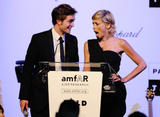 http://img148.imagevenue.com/loc984/th_84617_88_Robert_Pattinson_amfAR_Cinema_Against_AIDS_-_Arrivals0_May_21_122_984lo.jpg